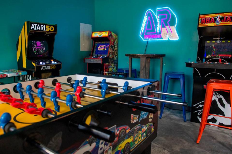 A game room and arcade inside Altered Reality Brewing on Howard Avenue in Biloxi will be a hit with families.