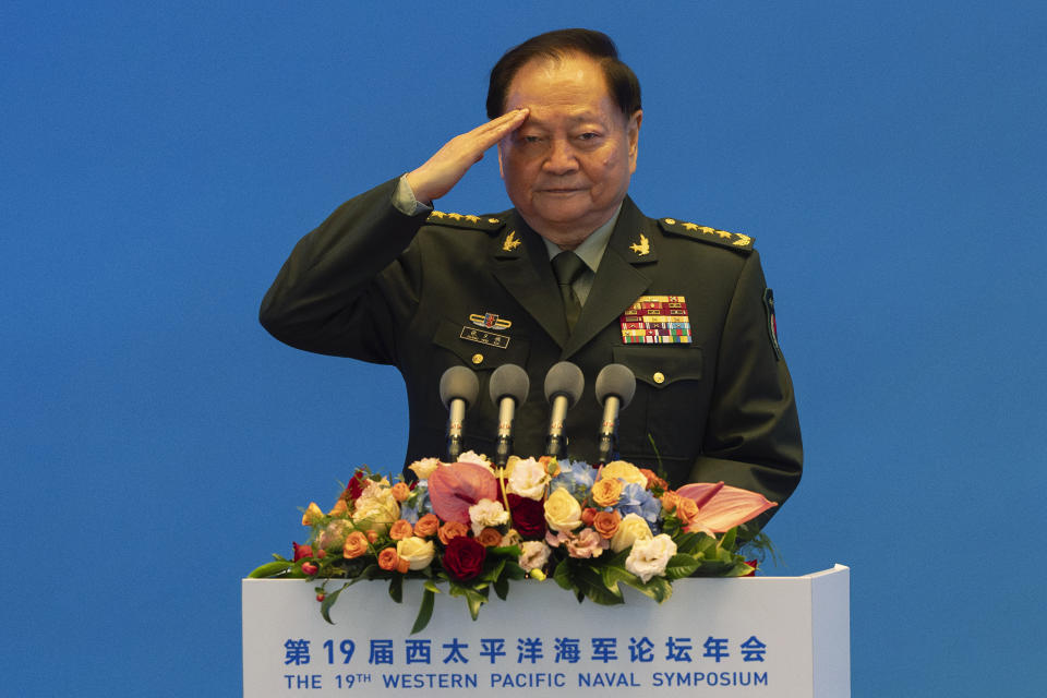 Zhang Youxia, vice chairman of the CPC Central Military Commission, salutes before addressing the Western Pacific Navy Symposium in Qingdao, eastern China's Shandong province on Monday, April 22, 2024. Zhang, China's second-ranking military leader under Xi Jinping, said China committed to solve maritime disputes through dialogue but warned that International law could not be distorted. (AP Photo/Ng Han Guan)