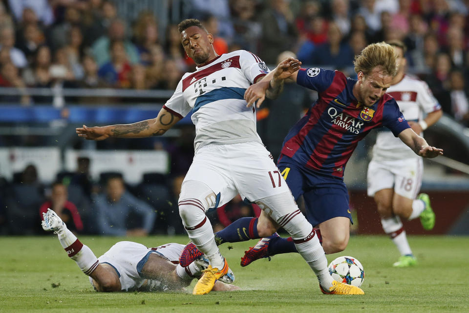 Football - FC Barcelona v Bayern Munich - UEFA Champions League Semi Final First Leg - The Nou Camp, Barcelona, Spain - 6/5/15 Barcelona's Ivan Rakitic in action with Bayern Munich's Jerome Boateng Reuters / Albert Gea