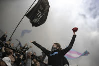 In this Sept. 29, 2019, photo, Minnesota United fans celebrate a second-half goal by Minnesota United defender Michael Boxall against Los Angeles FC at Allianz Field in St. Paul, Minn. The first season for Minnesota United at Allianz Field has been a sold-out success. As the Loons prepare for their first MLS playoff game, they'll have their raucous supporters section behind them to help. (Jerry Holt/Star Tribune via AP)