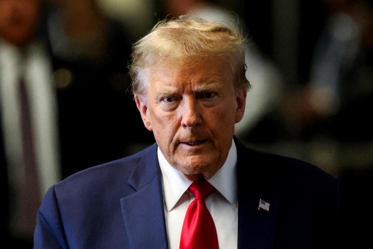 <span>Donald Trump attends a hearing on a criminal case linked to a hush money payment on 15 February.</span><span>Photograph: Andrew Kelly/Reuters</span>