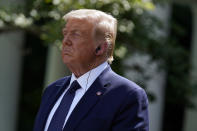 President Donald Trump listens as Mexican President Andres Manuel Lopez Obrador speaks during an event in the Rose Garden at the White House, Wednesday, July 8, 2020, in Washington. (AP Photo/Evan Vucci)