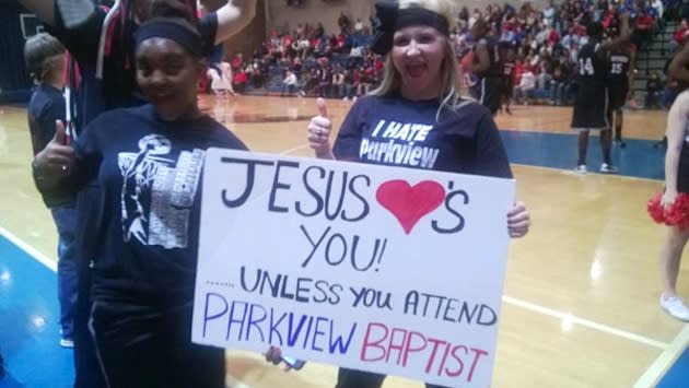 The Jesus Loves You sign that landed Patterson students in trouble — WAFB video screenshot