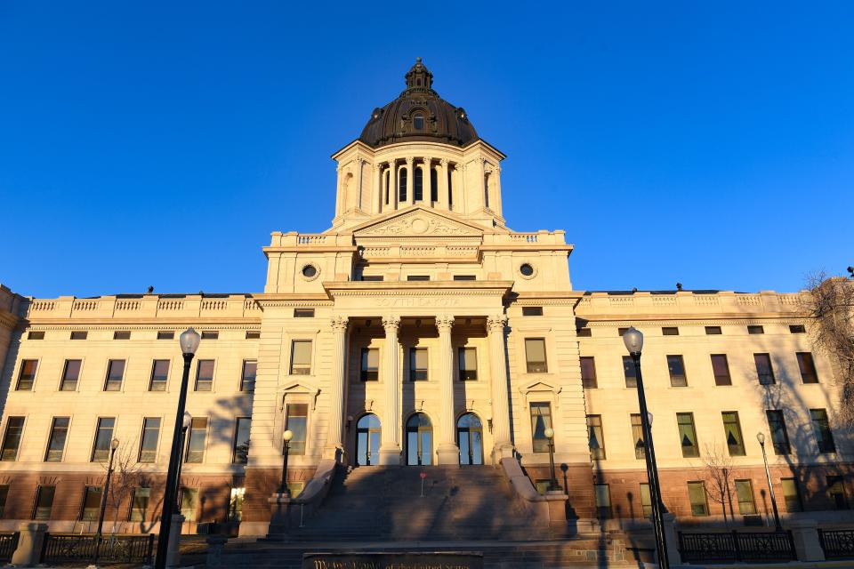 Sun sets on the South Dakota State Capitol on Monday, Jan. 11, 2021, in Pierre.