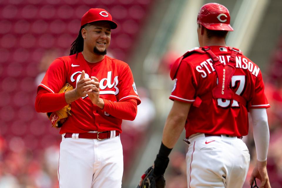 Cincinnati Reds starting pitcher Luis Castillo (58) speaks to Cincinnati Reds catcher Tyler Stephenson (37) in the fourth inning of the MLB game between the Cincinnati Reds and the Washington Nationals in Cincinnati at Great American Ball Park on Sunday, June 5, 2022.