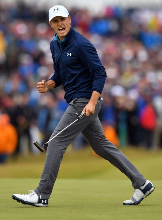 US golfer Jordan Spieth reacts after making his putt on the 16th green for birdie on July 23, 2017