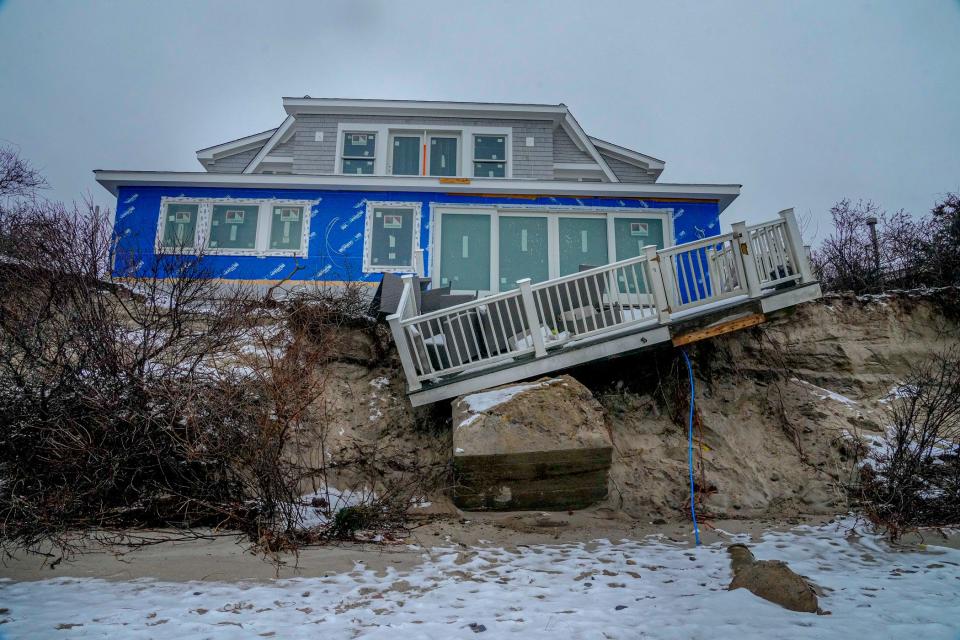 Storm-driven erosion on the coast at Roger Wheeler State Beach in Narragansett on Tuesday. Scientists expect that the forces driving erosion will only grow more powerful as extreme storms become more frequent and as seas rise.