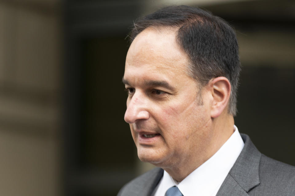 Michael Sussmann, a cybersecurity lawyer who represented the Hillary Clinton presidential campaign in 2016, leaves federal courthouse in Washington, Monday, May 16, 2022. A jury was picked Monday in the trial of a lawyer for the Hillary Clinton presidential campaign who is accused of lying to the FBI as it investigated potential ties between Donald Trump and Russia in 2016. (AP Photo/Manuel Balce Ceneta)