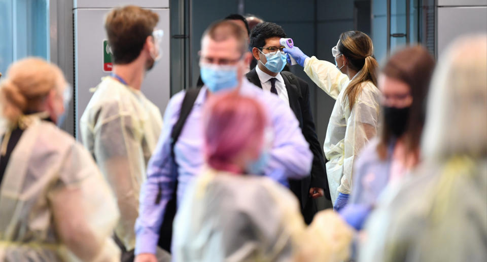 Passengers being screened for fevers at Sydney International Airport