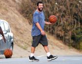 <p>Adam Sandler works up a sweat playing basketball on Saturday in Malibu. </p>