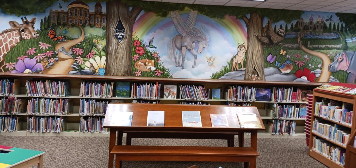 The Clyde Public Library has added new mural.