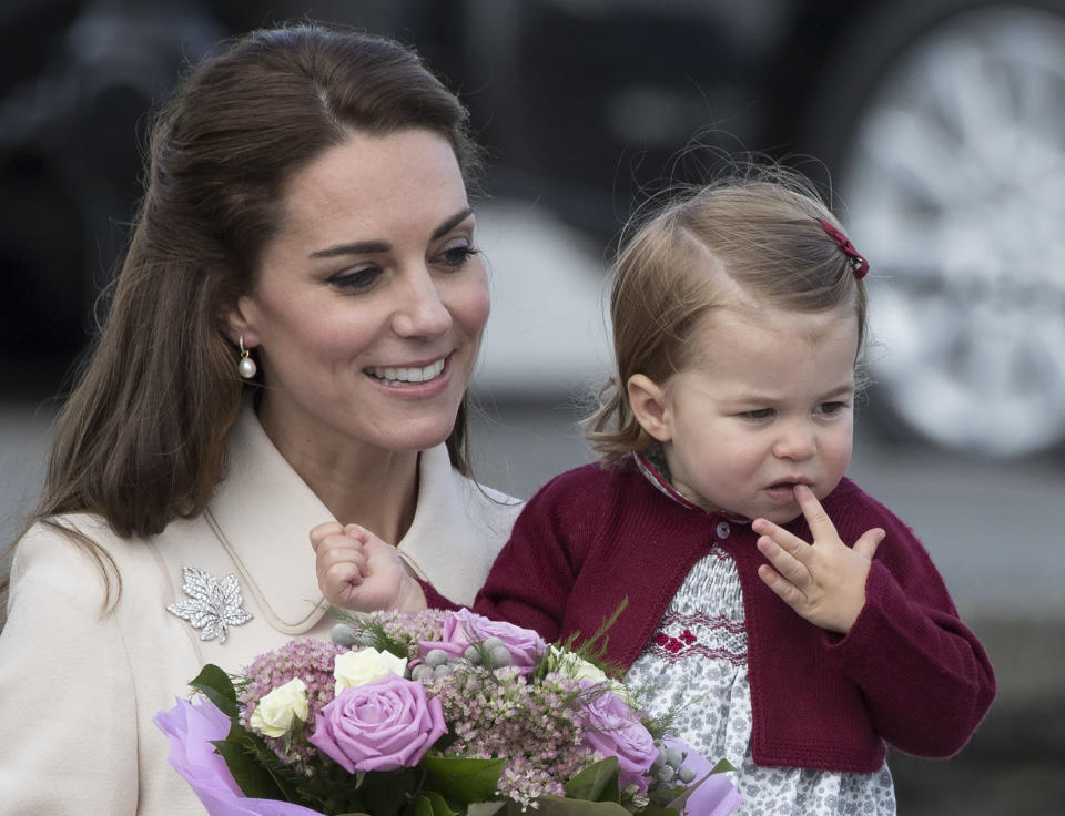 The Duchess of Cambridge and Princess Charlotte after a ceremony to mark their departure at Victoria Harbour seaplane terminal in Victoria during the Royal Tour of Canada on Oct. 1, 2016.