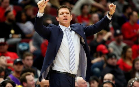 Los Angeles Lakers coach Luke Walton gestures to players during a game - Credit: AP