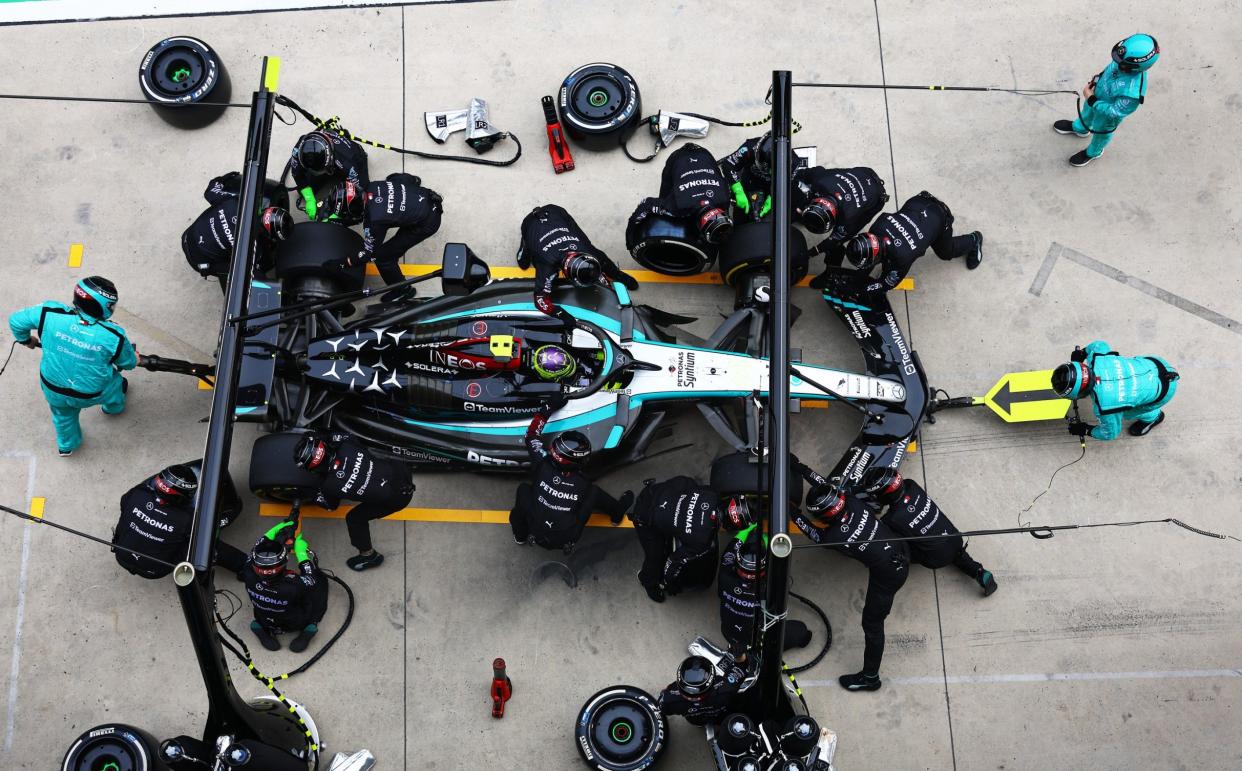 Lewis Hamilton of Great Britain driving the (44) Mercedes AMG Petronas F1 Team W15 makes a pitstop during the F1 Grand Prix of China at Shanghai International Circuit on April 21, 2024 in Shanghai, China