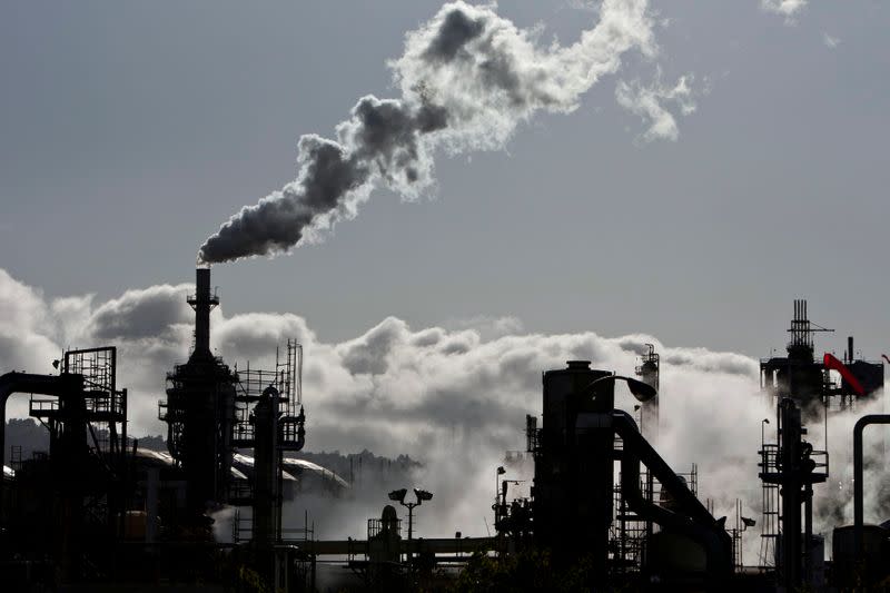 FILE PHOTO: Vapor is released into the sky at a refinery in Wilmington