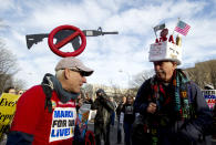 <p>Steven Rothman, left, and Dan Knorowski attend the March for Our Lives rally in Washington in support of stricter gun control. (Photo: AP/Jose Luis Magana) </p>