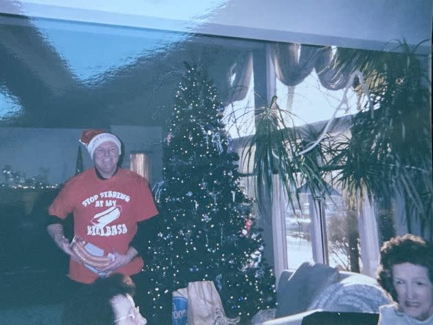 Keith celebrates the holidays with a silly gift from Great-Aunt Lillian (far right).