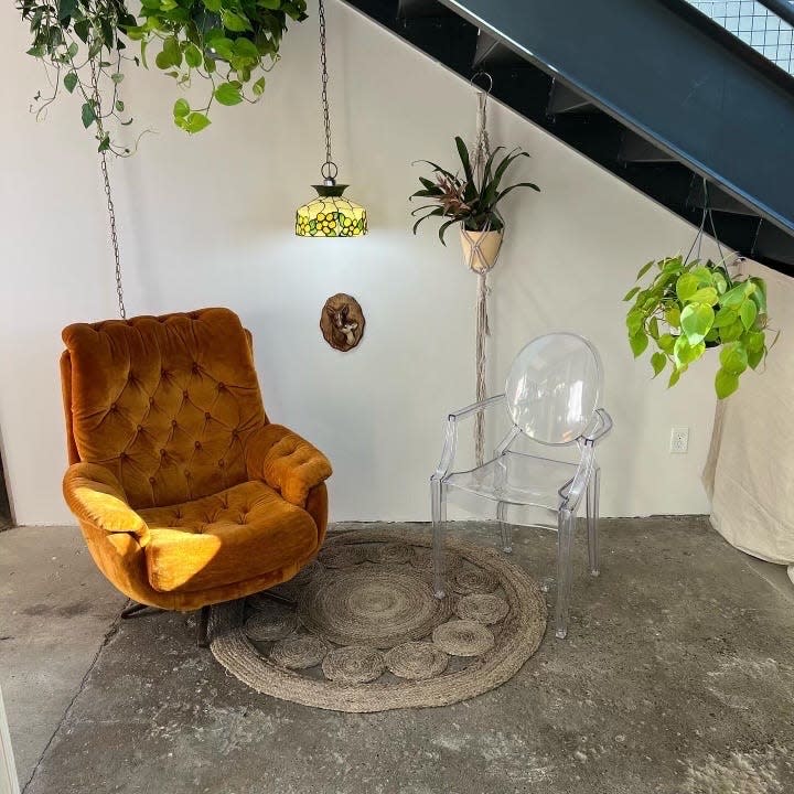 The downstairs seating area is part of Thistle's Summit, a new bakery in downtown Des Moines that also offers astrology appointments.