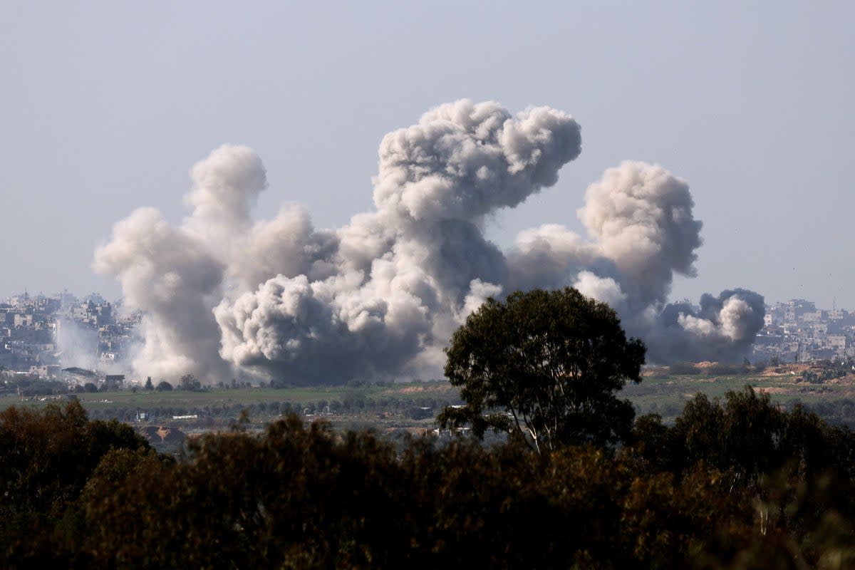 Smoke billows over the Gaza Strip as Israel carries out airstrikes (AFP/Getty)