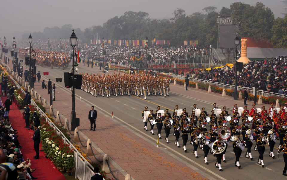 Indian defense forces march on the ceremonial street Kartavyapath boulevard during India's Republic Day parade celebrations in New Delhi, India, Friday, Jan. 26, 2024. (AP Photo/Manish Swarup)