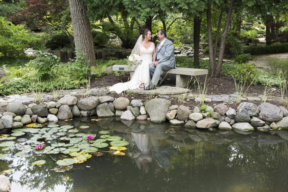 "Christina and Rick celebrated the next stage of their lives in marriage surrounded by their closest family and friends in the beautiful gardens in Janesville, Wisconsin." --&nbsp;<i>Trish Henry</i>