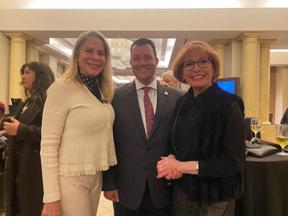Palm Desert Mayor Jan Harnik and Eastvale Mayor Clint Lorimore pose with philanthropist Gail Moore at Rotary District 5330's Community Fundraising Dinner to Fight Against Human Trafficking on Jan. 29, 2022.