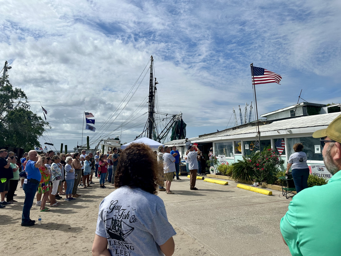 Charles Gay and other veterans salute the U.S. flag Saturday morning prior to the Gay Fish Company’s inaugural “Blessing of the Fleet” ceremony. The veteran-owned fishery celebrated its 75th anniversary in 2023, making it one of the oldest shrimp companies in Beaufort County.