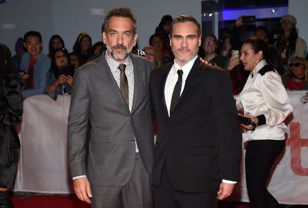 Director Todd Phillips and actor Joaquin Phoenix attend a premiere for 