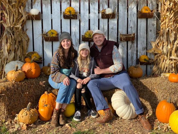 Savannah Bay Strandin and Tristan Tapscott, with his daughter Harper Leigh (named for the “To Kill a Mockingbird” author).