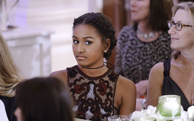 Sasha Obama sitting next to Blake Lively. (Photo: Getty Images)