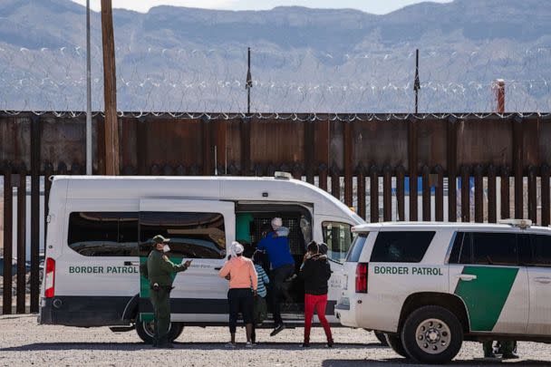 PHOTO: Border Patrol agents apprehend a group of migrants near downtown El Paso, Texas following the congressional border delegation visit on March 15, 2021. (Justin Hamel/AFP via Getty Images, FILE)