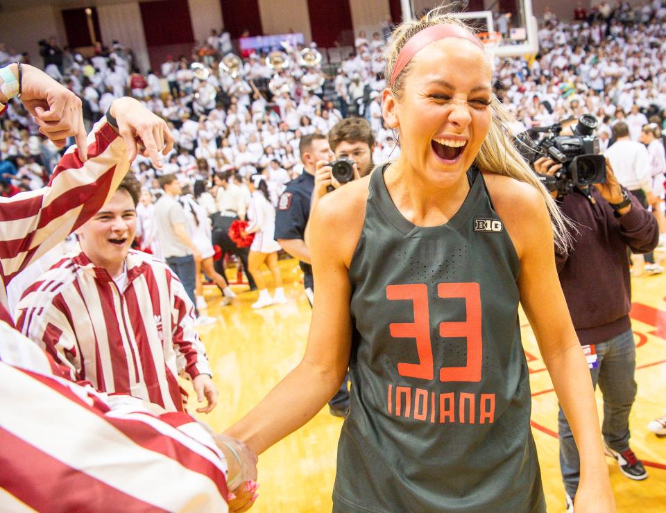 Indiana's Sydney Parrish (33) celebrates with fans after the second half of the Indiana versus Iowa women's basketball game at Simon Skjodt Assembly Hall on Thursday, Feb. 22, 2024.