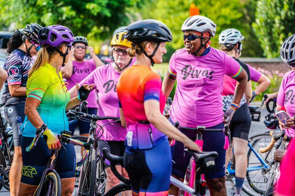 Army Master Sergeant Michelle Smith, right, arrives for a group ride with the IU Health Momentum Indy Divas cycling group on Thursday, July 16, 2023, in Carmel, Ind. 