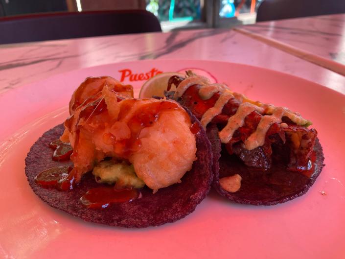 A tamarindo shrimp taco and filet mignon taco from Puesto at the Headquarters in San Diego on April 6, 2022.