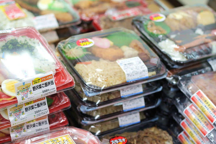 Stacks of carefully arranged 'bento' boxes ready to be enjoyed in the office, at the park... or on a train — Pictures by CK Lim