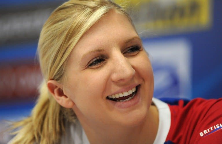 Rebecca Adlington at a news conference at the 2011 World Championships in Shanghai. The double Olympic champion has announced her retirement from competitive swimming at the age of 23