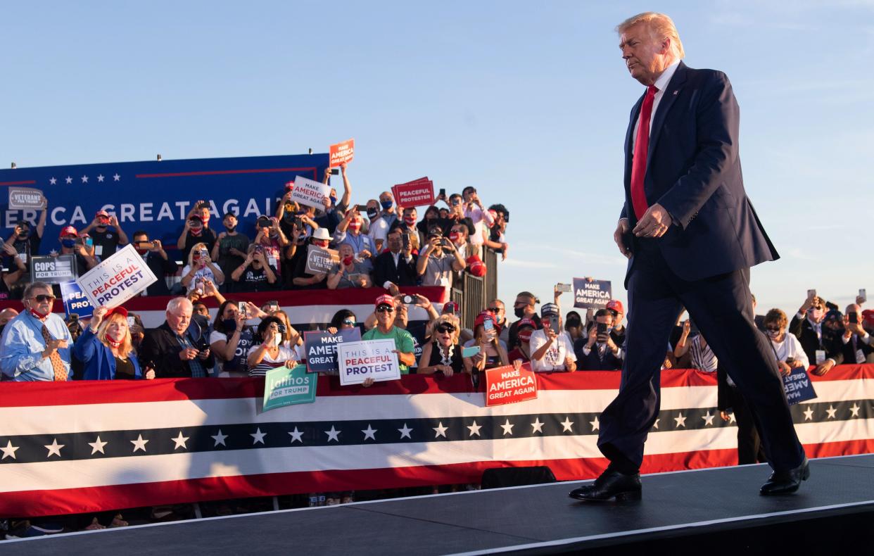 Donald Trump walking (AFP via Getty Images)