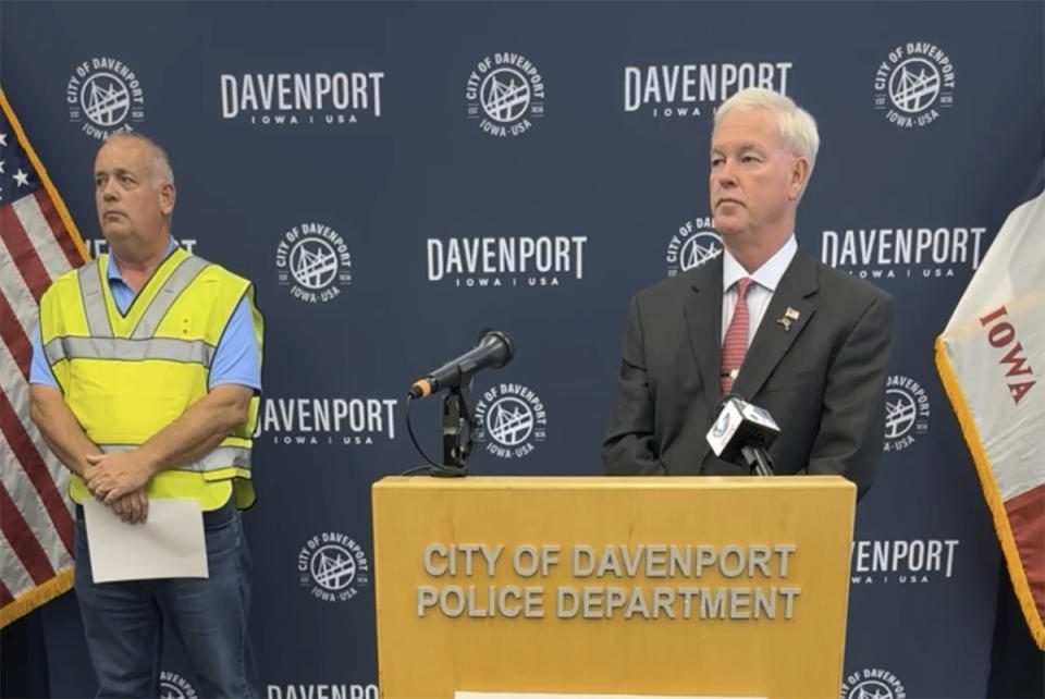 Davenport Fire Chief Carlsten and Mayor Mike Matson provide an updated on the \ building collapse during a news conference, Monday, May 29, 2023 in Davenport, Iowa. Carlsten said that it was unclear how many people, if any, were still missing after an apartment building in the eastern Iowa city collapsed. (City of Davenport via AP)