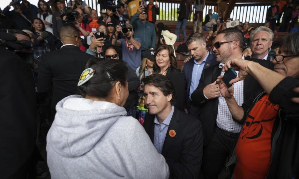 Justin Trudeau with a residential school survivor at the Kamloops ceremony on Monday.