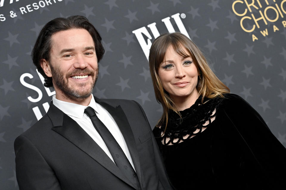 Closeup of Tom Pelphrey and Kaley Cuoco on the red carpet