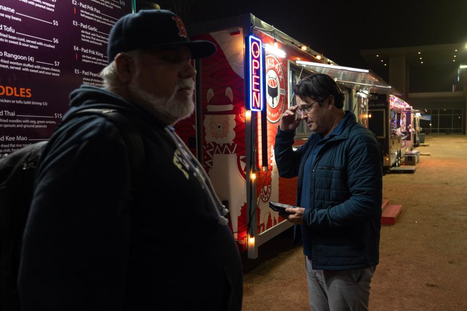 Eric Perardi orders from a food truck at the Crossover in Cedar Park. After internet sleuthing helped confirm some of Perardi's suspicions about Saint Jovite Youngblood, he went to the FBI. The FBI then set up an operation at a North Austin restaurant with Perardi, Youngblood and an undercover agent.