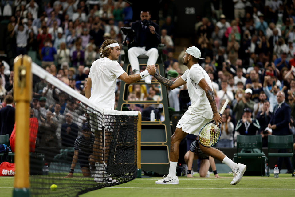 Stefanos Tsitsipas (pictured left) and Nick Kyrgios (pictured right) shake hands after their third round Wimbledon match.