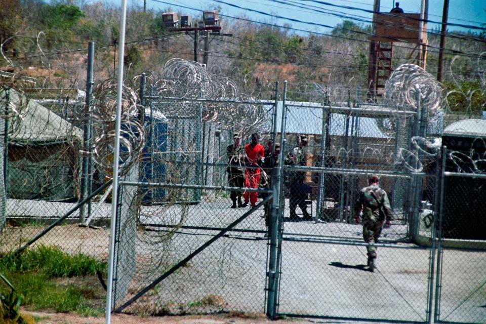 A military base seen through a fence.