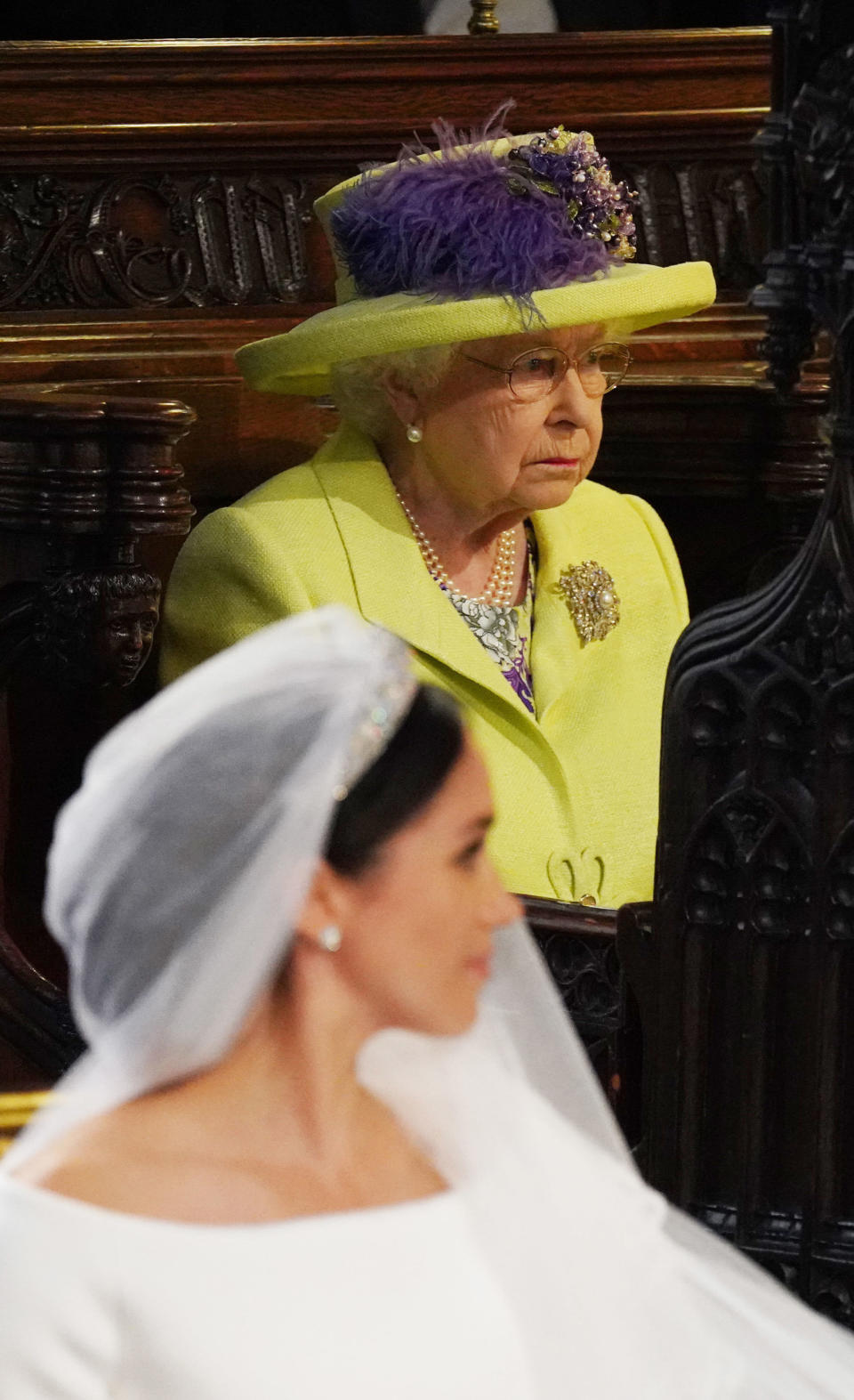 Queen Elizabeth and Meghan Markle.