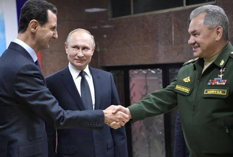 Russian President Putin meets with his Syrian counterpart Assad in Damascus