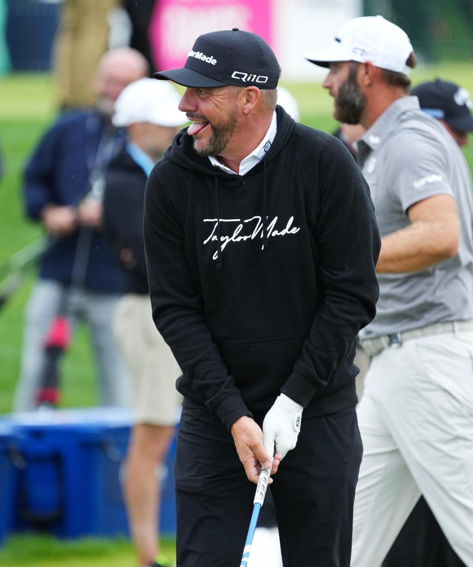 Michael Block shares a laugh as he works on the driving range during a practice round for the PGA Championship on Tuesday at Valhalla Golf Club.