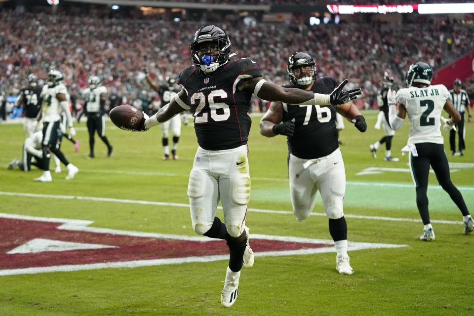 Arizona Cardinals running back Eno Benjamin (26) celebrates after scoring a touchdown against the Philadelphia Eagles during the second half an NFL football game, Sunday, Oct. 9, 2022, in Glendale, Ariz. (AP Photo/Ross D. Franklin)