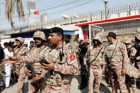 Paramilitary soldiers gather after an attack on the Chinese consulate, in Karachi, Pakistan November 23, 2018. REUTERS/Akhtar Soomro