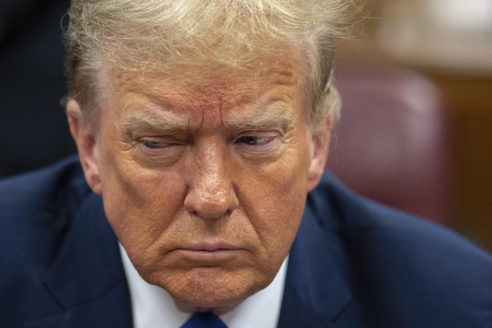 Former President Donald Trump awaits the start of proceedings during jury selection at Manhattan criminal court, Thursday, April 18, 2024 in New York. (Jeenah Moon/Pool Photo via AP)