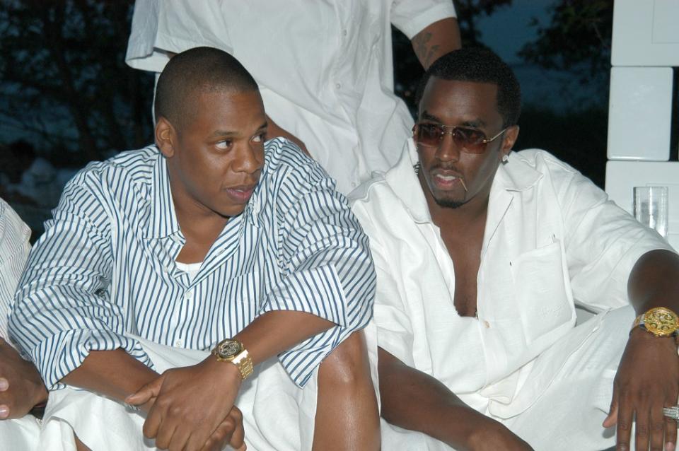 Diddy hosted an annual White Party in East Hampton every summer that attracted stars like Jay Z (left). Dimitrios Kambouris/WireImage.co